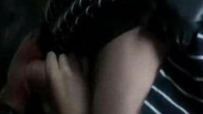 A teen with glasses milks the cock of an old dude that is with her